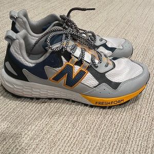 New Balance Trail Running Men size 9.5. Great condition. Worn Once.